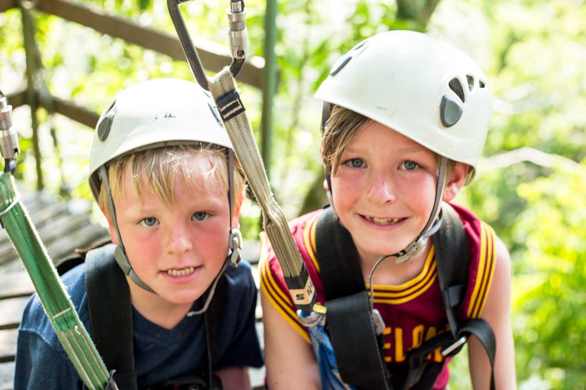 Ziplining is a fun tourist activity in Belize, Puerto Rico, Mexico and more